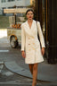 white blazer dress with golden buttons 